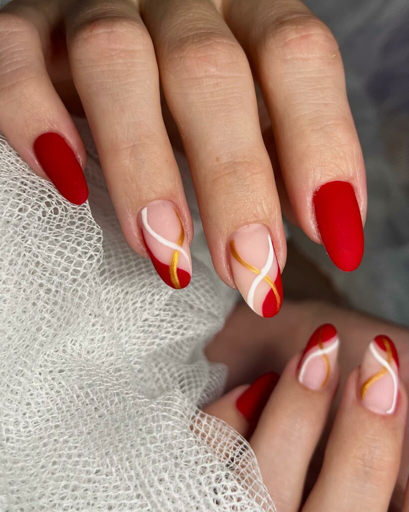 Golden Swirls on Red and White Nails