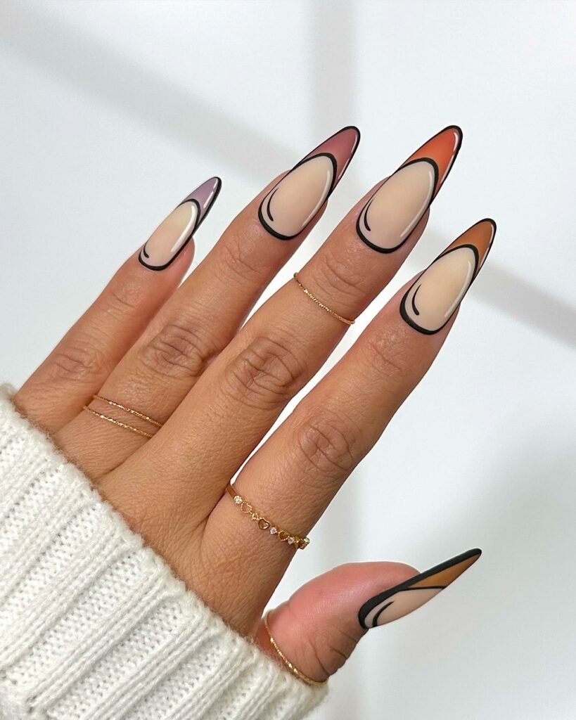 Elegant Almond Shaped Cartoon Nail Creations