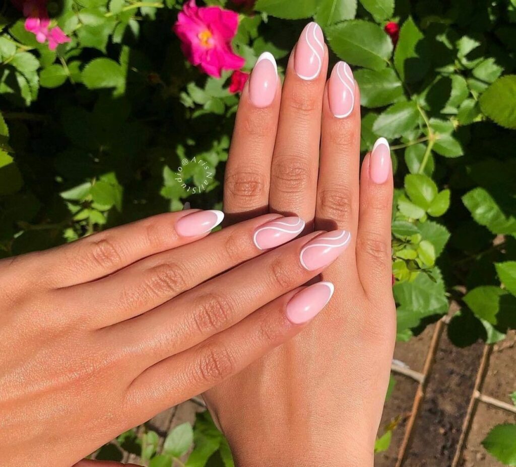 White Swirls On Pink Nails