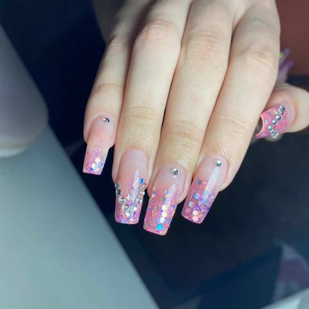 Clear Pink Nail With Rhinestone And Glitters