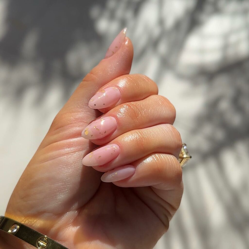 Almond Clear Pink Nail With Gold Glitters