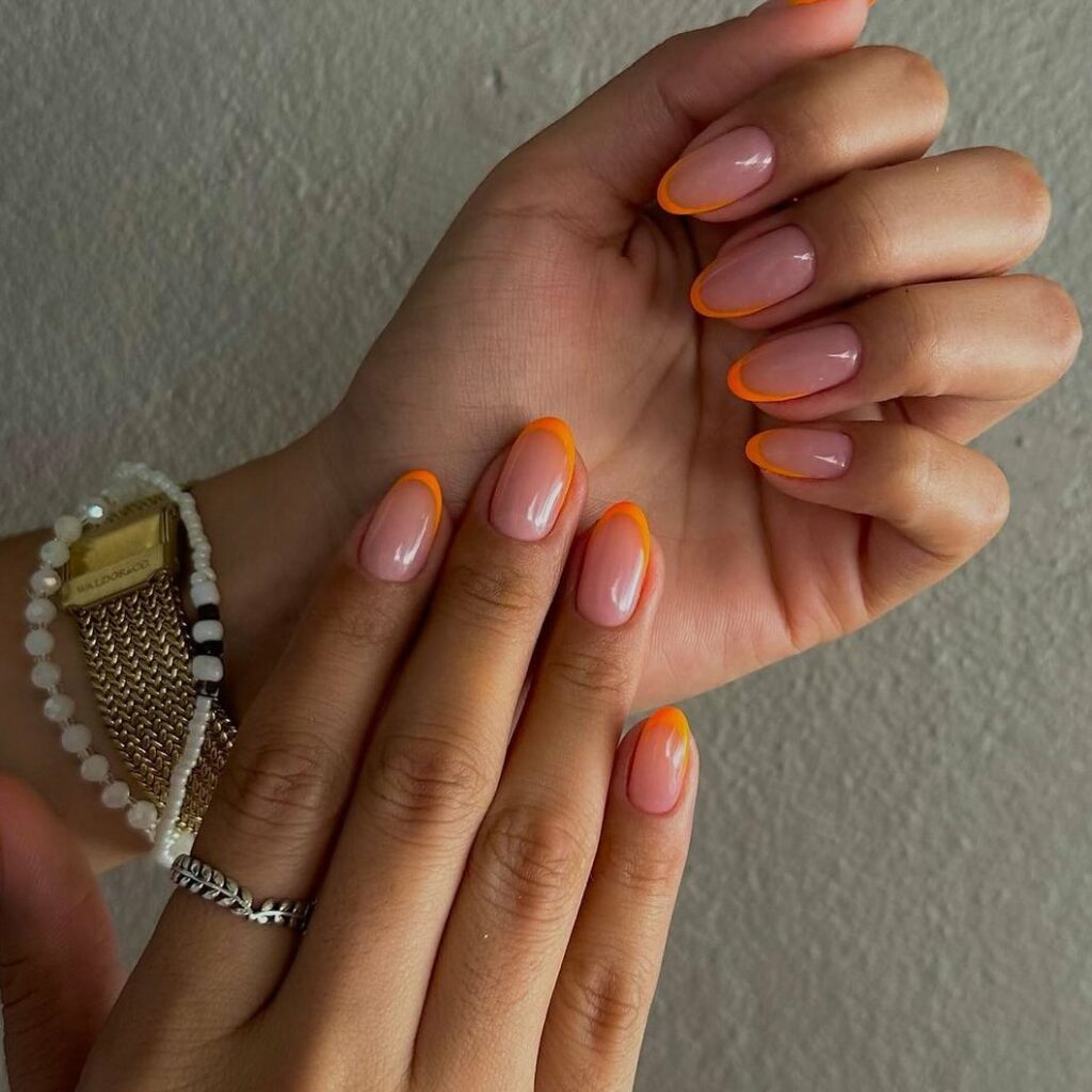 Glossy Clear Pink Nail With Orange Tips