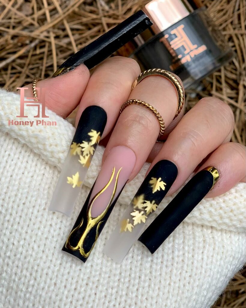 Accessorized Black and Gold Nails