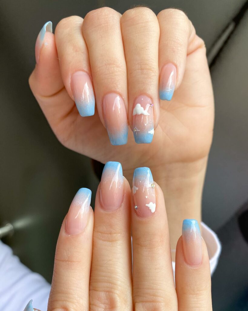 Blue Nails with Tranquil Cloud Designs