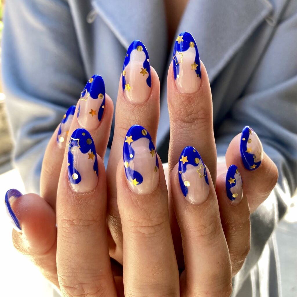  Blue Nails with Opulent Gold Embellishments