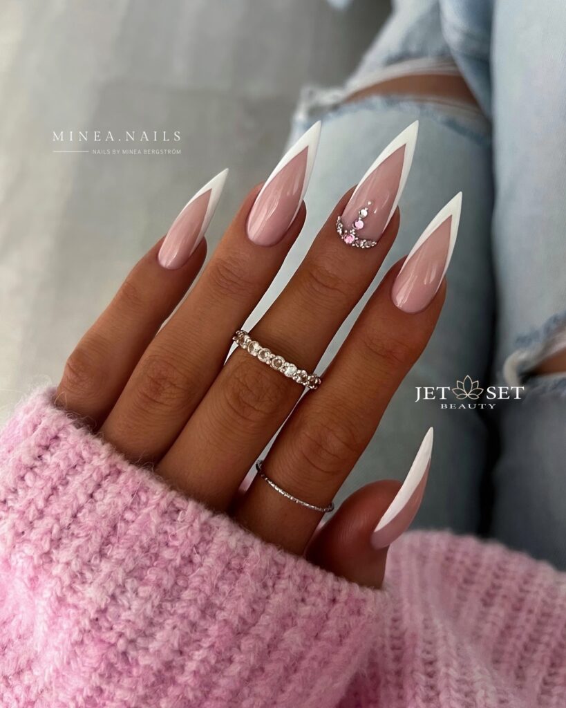 Classic Pink Stiletto Nails with a Touch of Sparkle