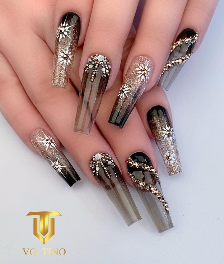 Cosmic Black and Gold Nails