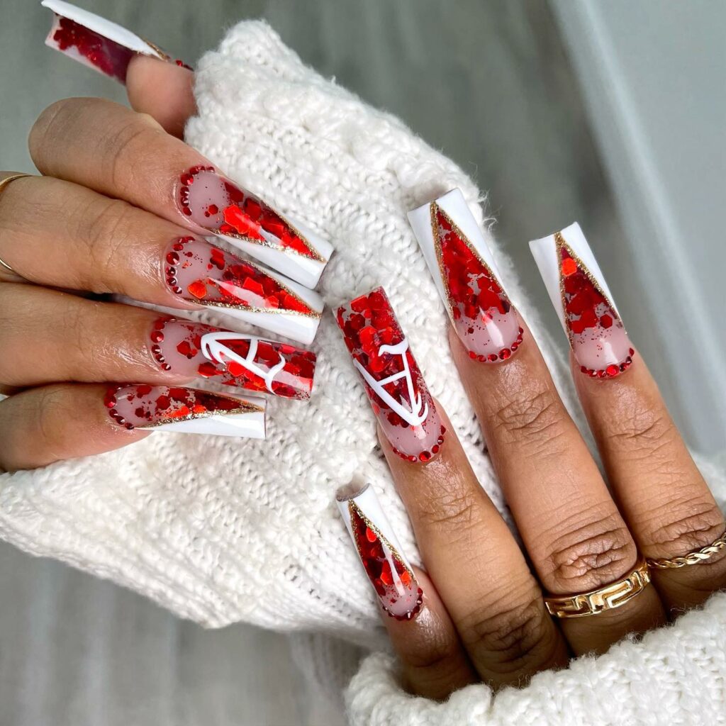 Crimson Confetti and Geometric Precision on Red Nails