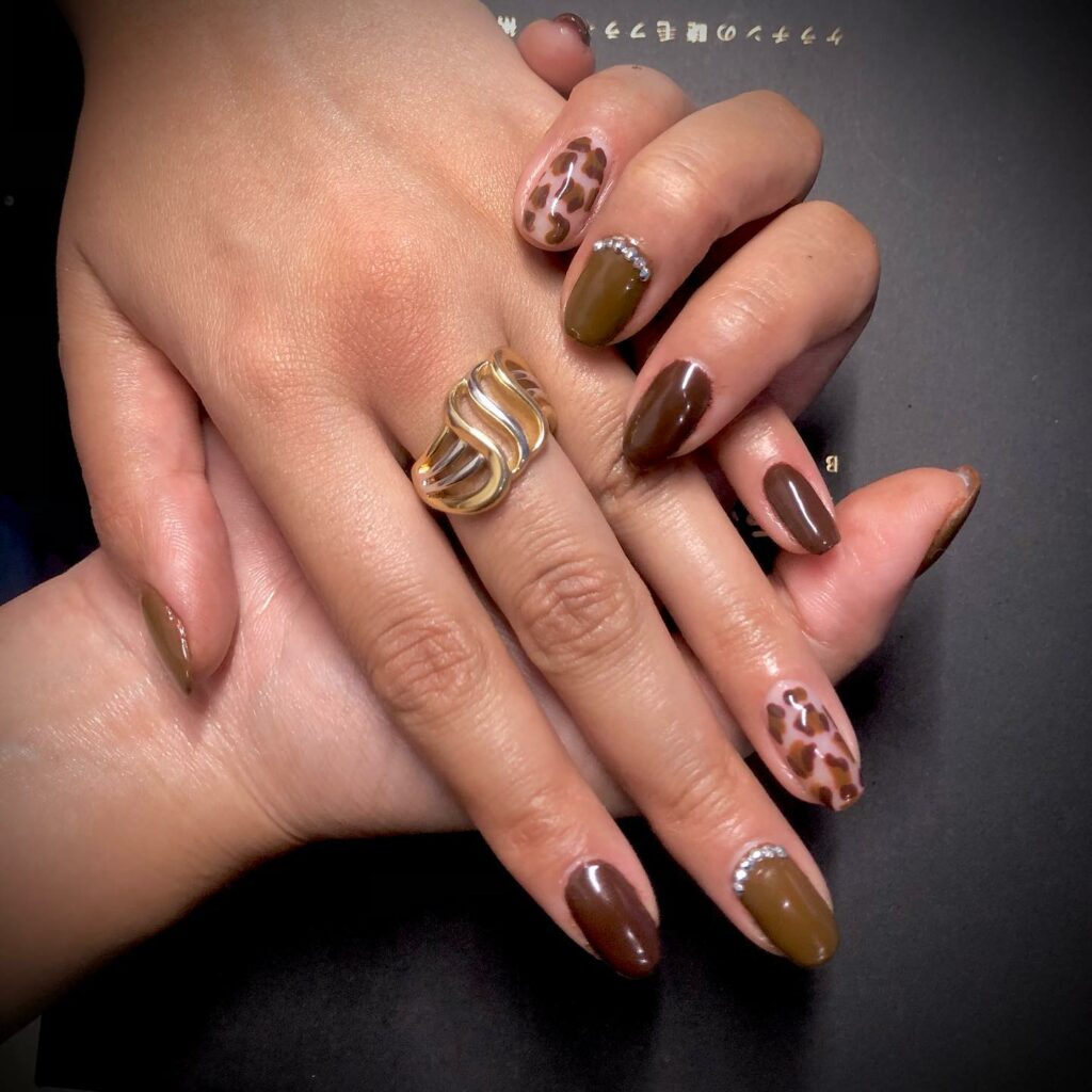 Deep Brown Nails with Animal Prints