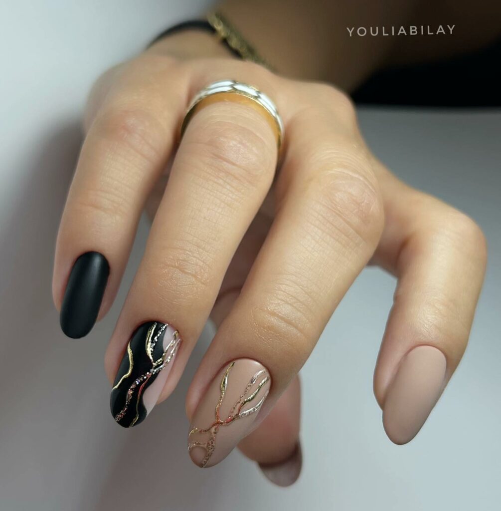 Elegance Black and Gold Nails