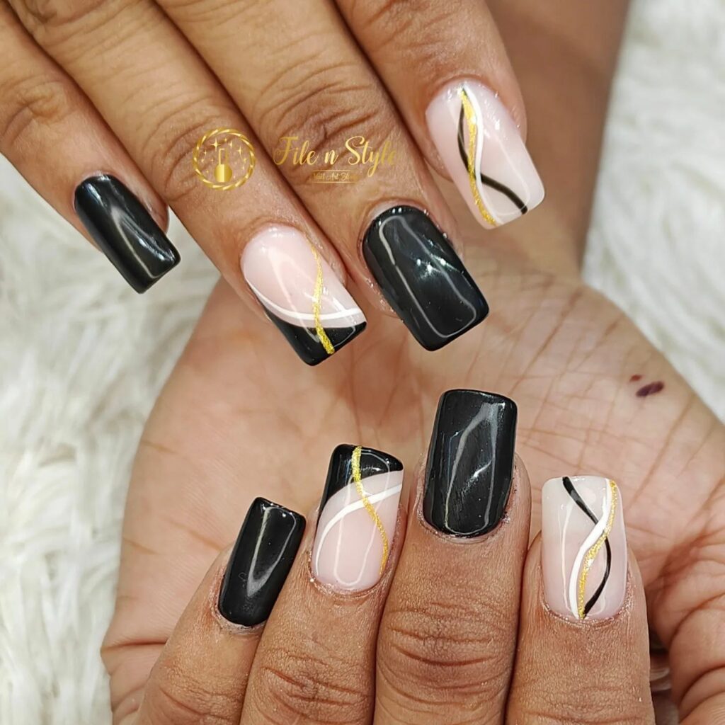 Floating Gold Flakes Black and Gold Nails