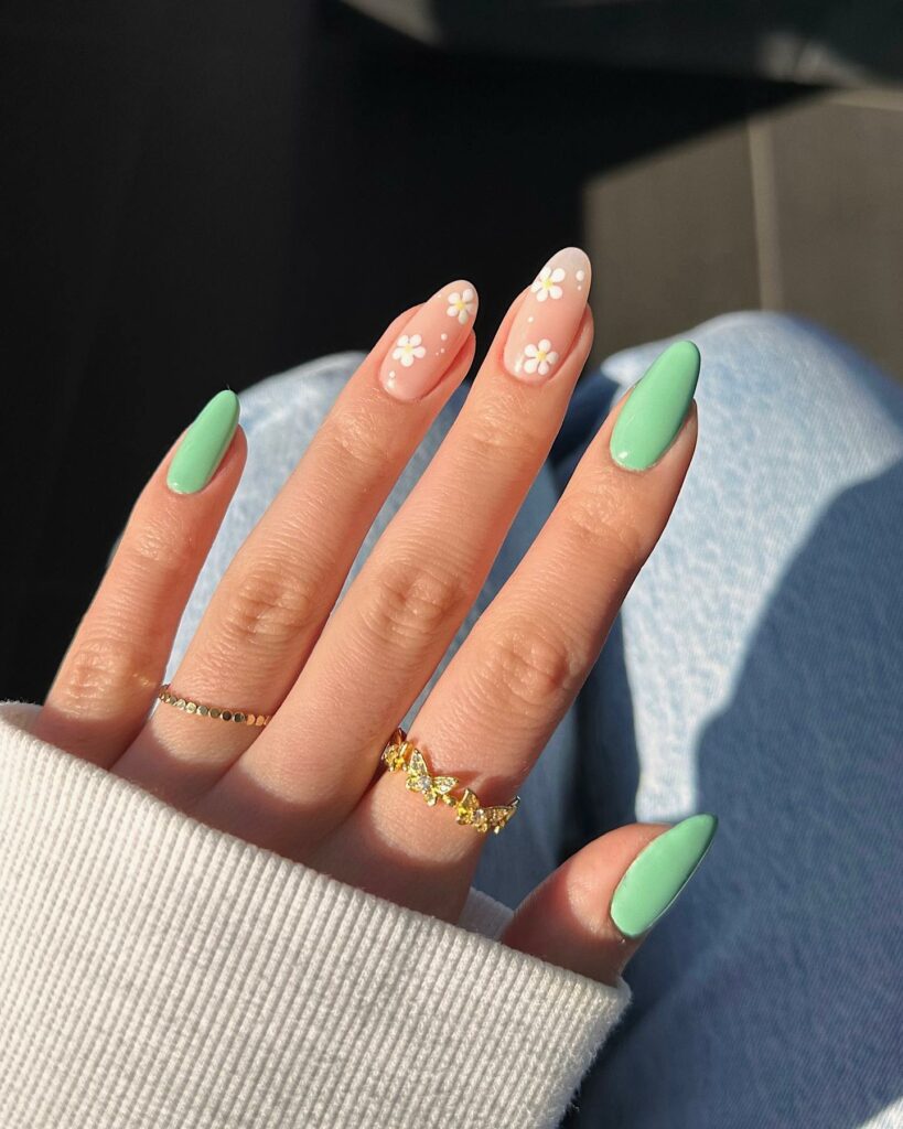 Pastel Hues with Blooming Floral Accents on Green Nails