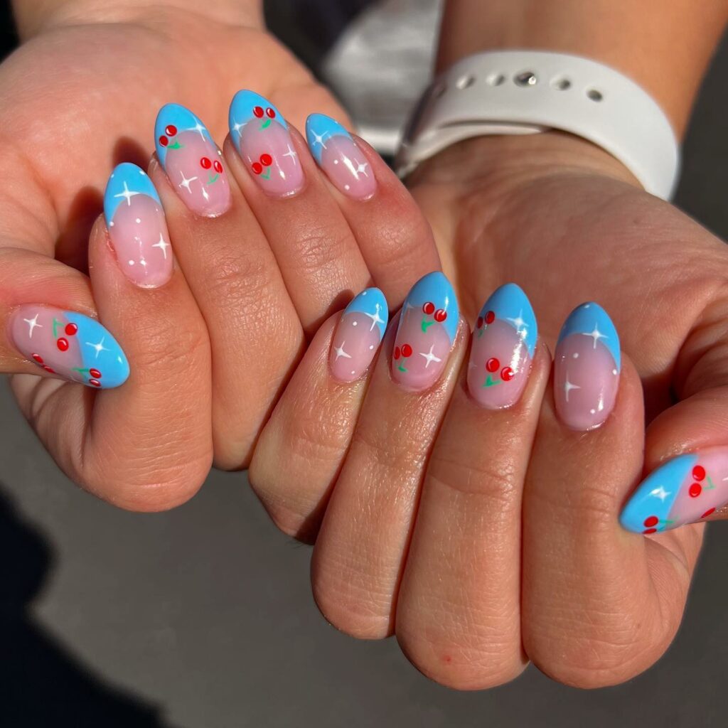 French Blue Nails with Playful Cherry Accents