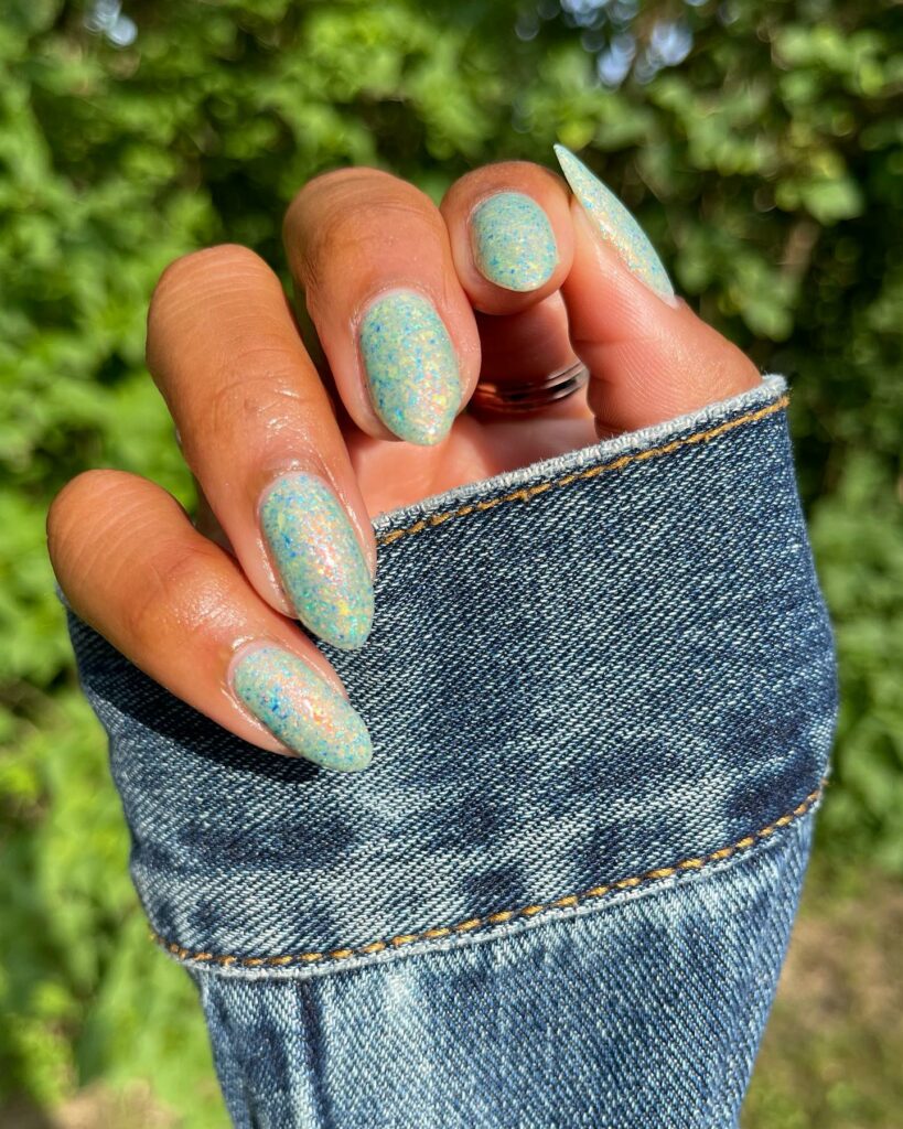 Glitter-Infused Mint Green Nails