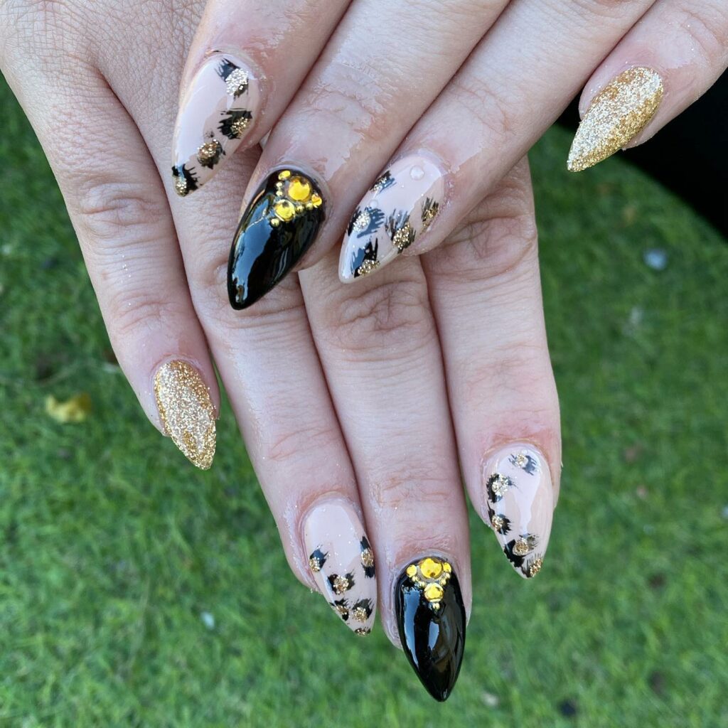 Leopard Black and Gold Nails