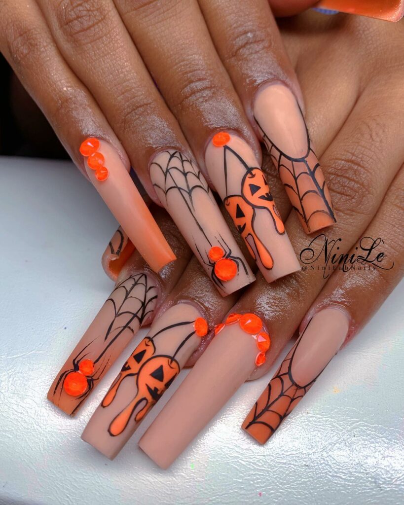 Orange spider web nail