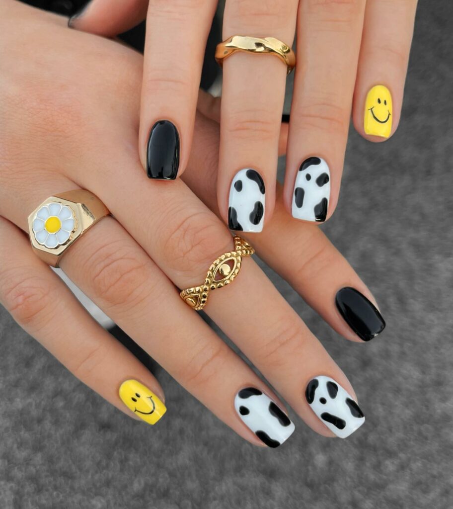 Playful Patterns on Black & White Nails