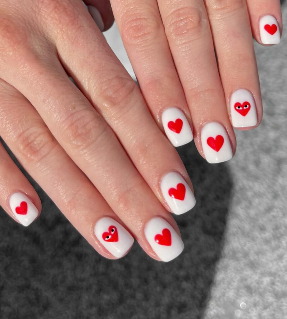 Red Hearts on a White Nail Canvas