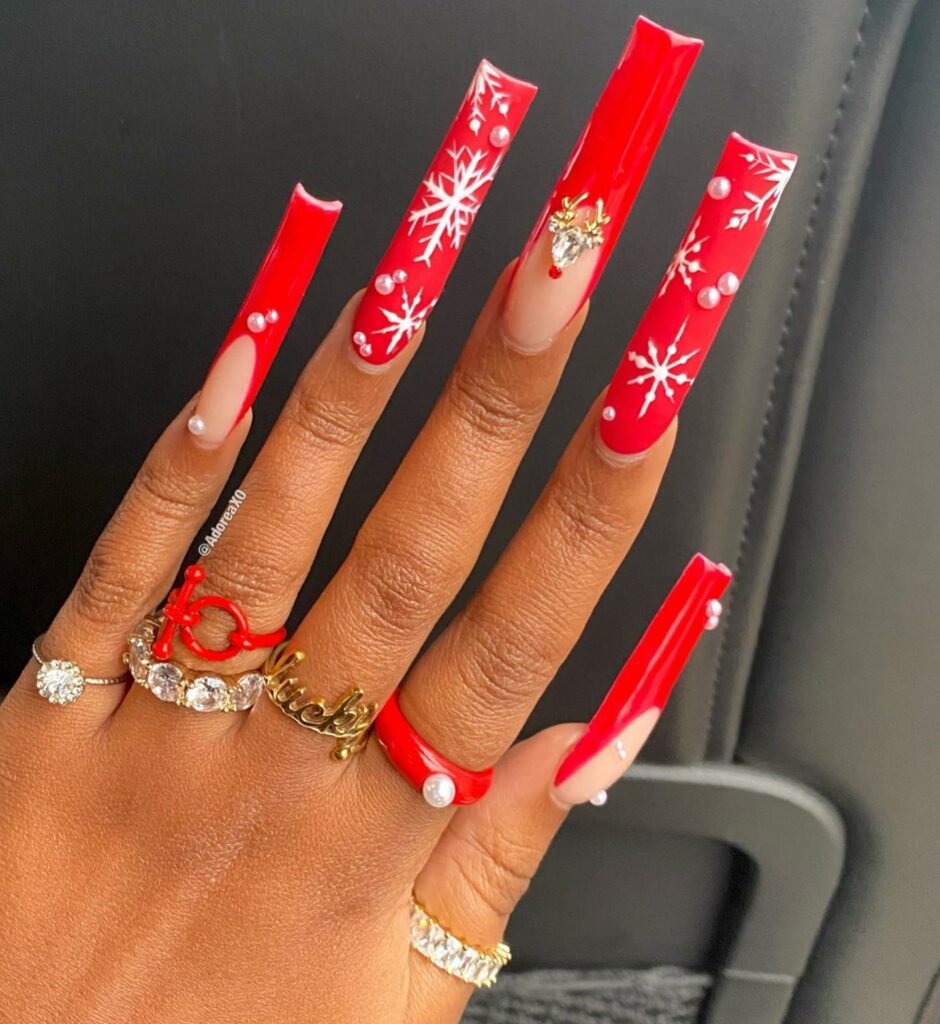 Red and White Nails Adorned with Snowflakes