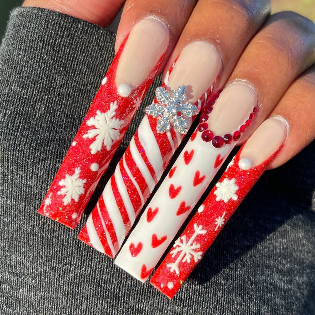 Snowflake Designs on a Red and White Nails