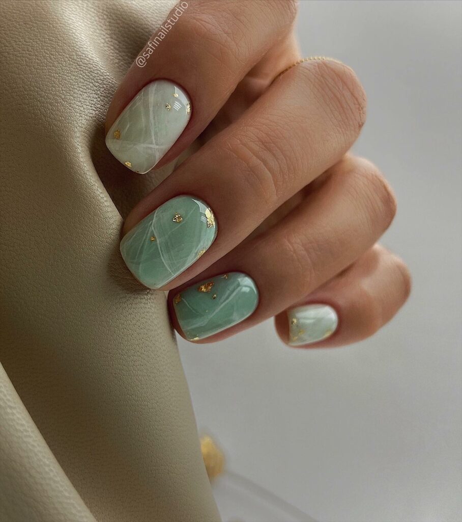 Short Mint Green Nails Adorned with Gold Foils