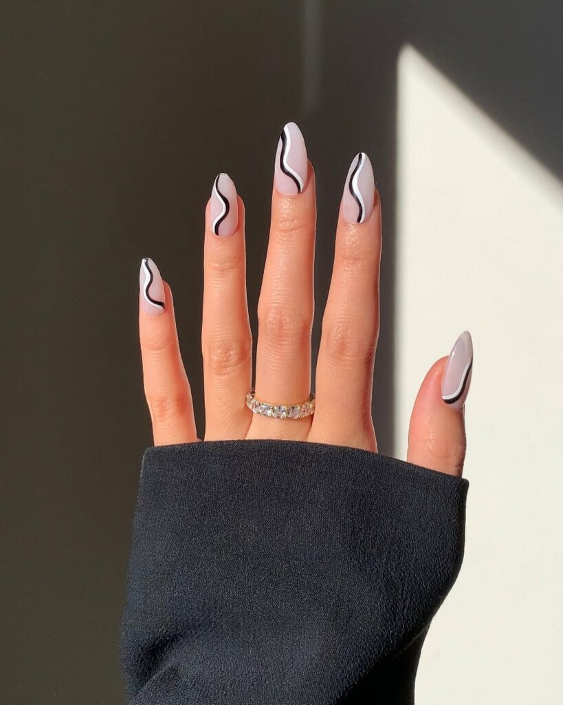 Dynamic Swirly Black and White Nails