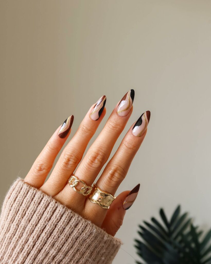 Swirls Black and Gold Nails