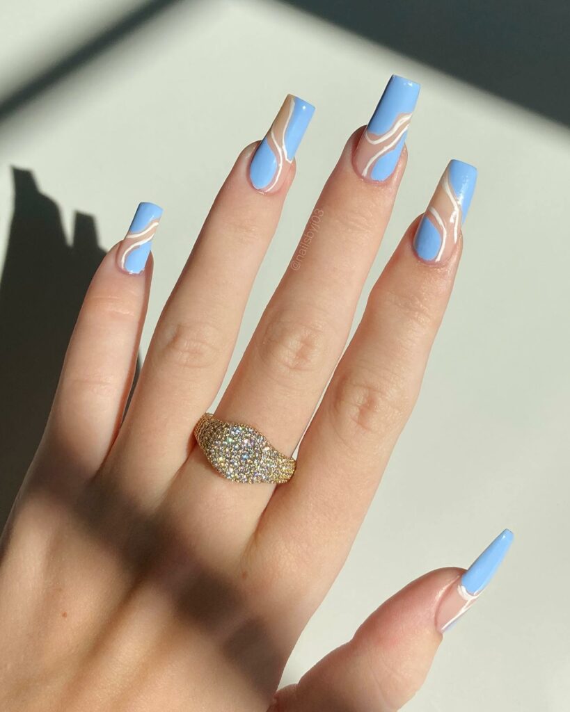 Swirly Patterns on Azure Blue Coffin Nails