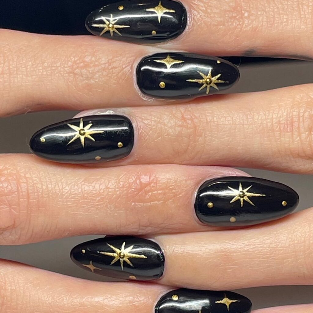 star Black and Gold Nails