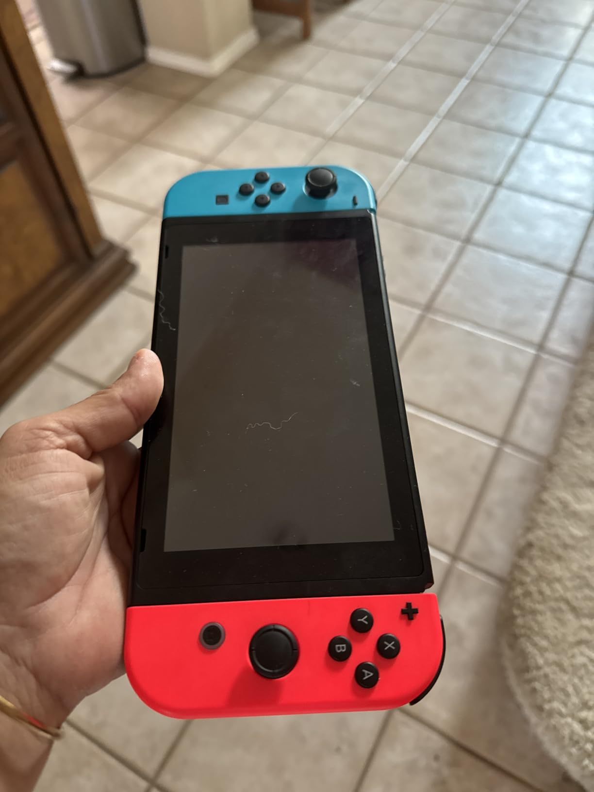 Nintendo Switch with Neon Blue and Neon Red Joy‑Con - Customer Photo 1