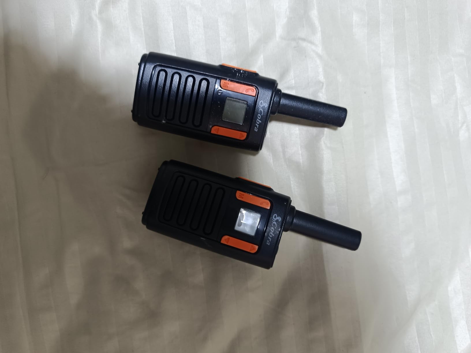 Cobra RX680 Walkie Talkies (2-Pack) - Rugged & Splashproof Two Way Radios Long Range, IP54 Water Resistant Design, 60 Pre-Programmed Channels, Weather Alerts, Included Charging Dock (Black/Orange) Customer Review Cobra RX680 Walkie Talkies (2-Pack) - Rugged & Splashproof Two Way Radios Long Range, IP54 Water Resistant Design, 60 Pre-Programmed Channels, Weather Alerts, Included Charging Dock (Black/Orange) - Customer Photo 5