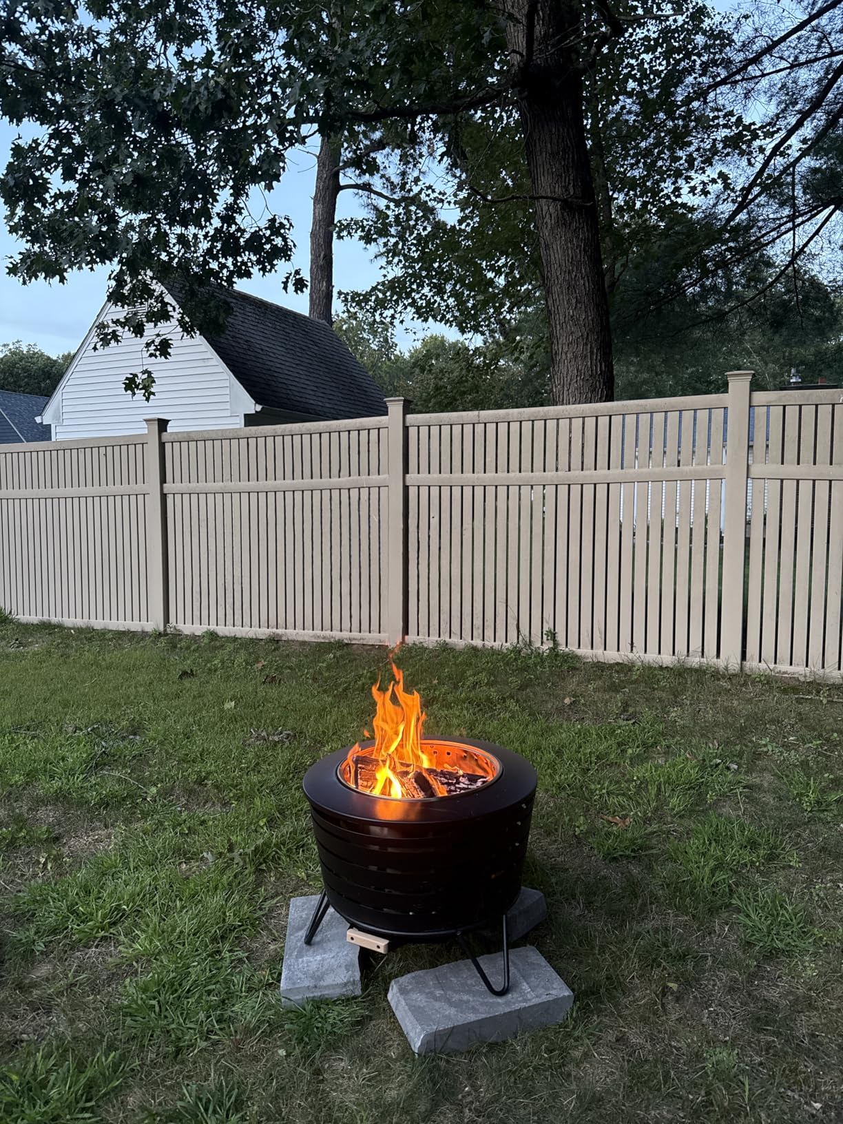 TIKI Patio Fire Pit Bundle – 25-Inch Smokeless Wood Burning Outdoor Fire Pit for Backyard, Patio, Deck & Garden with Removable Ash Pan, Stand & Weather-Resistant Cover – Modern Black Stainless Steel Customer Review TIKI Patio Fire Pit Bundle – 25-Inch Smokeless Wood Burning Outdoor Fire Pit for Backyard, Patio, Deck & Garden with Removable Ash Pan, Stand & Weather-Resistant Cover – Modern Black Stainless Steel - Customer Photo 2