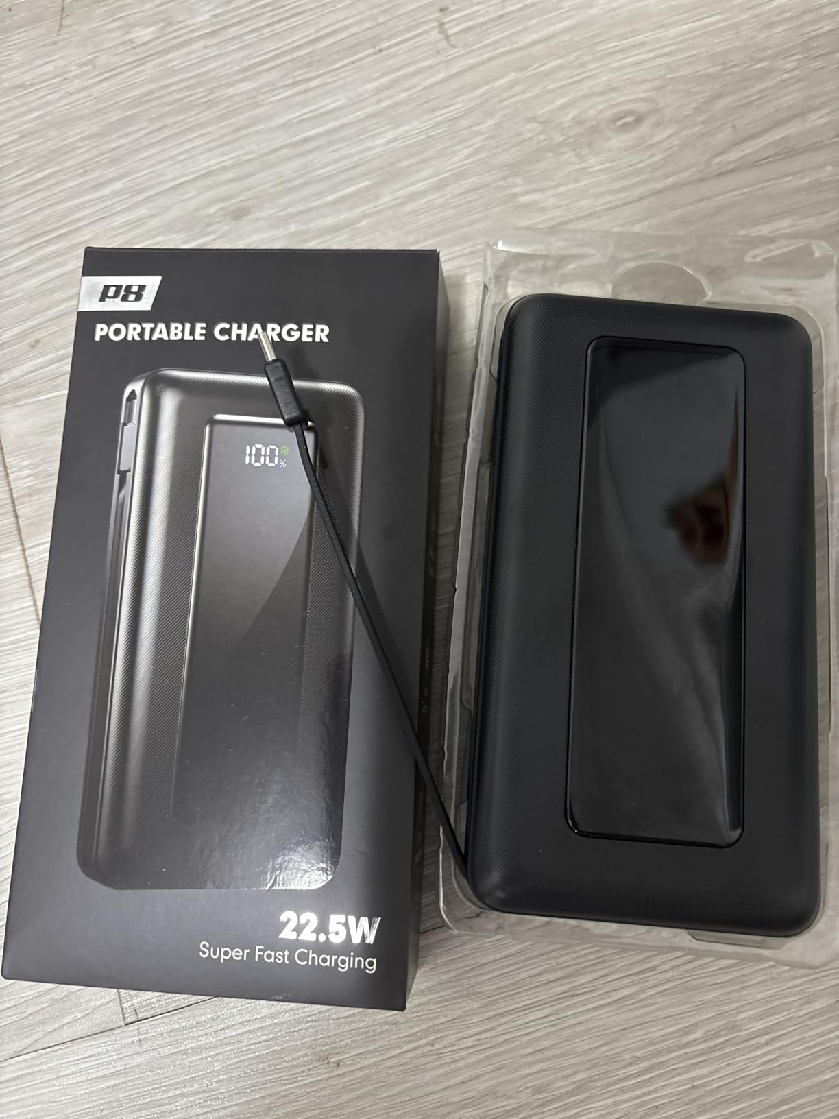 JKELAR Portable Charger, 50000mAh Power Bank with Built-in Cables, PD 22.5W Fast Charging with Flashlight, High-Capacity Portable Phone Charger for iPhone, Android, Travel Camping Essential Customer Review JKELAR Portable Charger, 50000mAh Power Bank with Built-in Cables, PD 22.5W Fast Charging with Flashlight, High-Capacity Portable Phone Charger for iPhone, Android, Travel Camping Essential - Customer Photo 1
