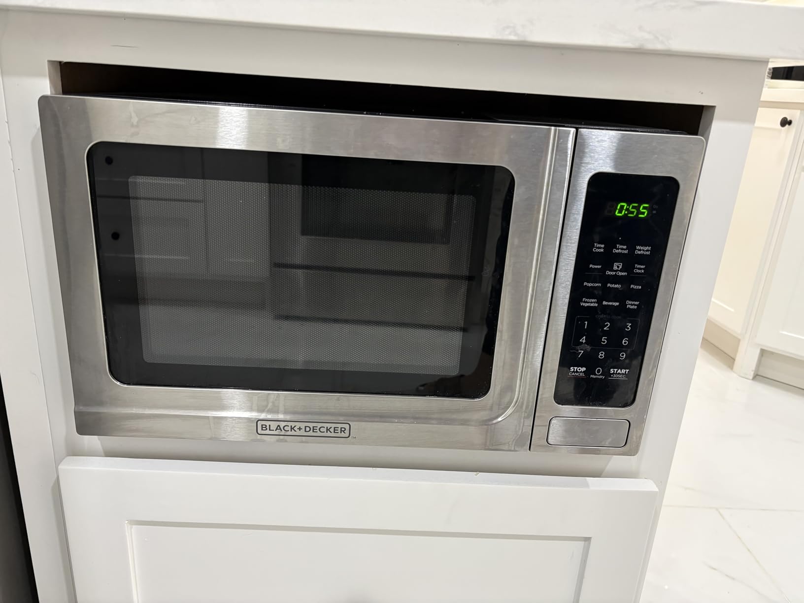 BLACK+DECKER Digital Microwave Oven with Turntable Push-Button Door, Child Safety Lock, Stainless Steel, 0.9 Cu Ft Customer Review BLACK+DECKER Digital Microwave Oven with Turntable Push-Button Door, Child Safety Lock, Stainless Steel, 0.9 Cu Ft - Customer Photo 1