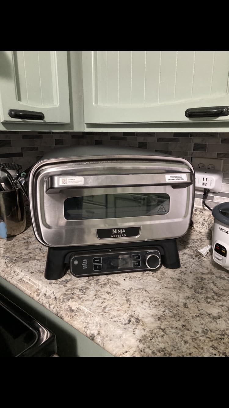 Ninja Artisan Outdoor Pizza Oven, 12-inch, 3-minute Pizza, Neapolitan, Thin Crust, New York Chicago, Custom, 700F Max Temperature, Electric Heat, Bake, Broil, Proof, Warm, MO201 Customer Review Ninja Artisan Outdoor Pizza Oven, 12-inch, 3-minute Pizza, Neapolitan, Thin Crust, New York Chicago, Custom, 700F Max Temperature, Electric Heat, Bake, Broil, Proof, Warm, MO201 - Customer Photo 1