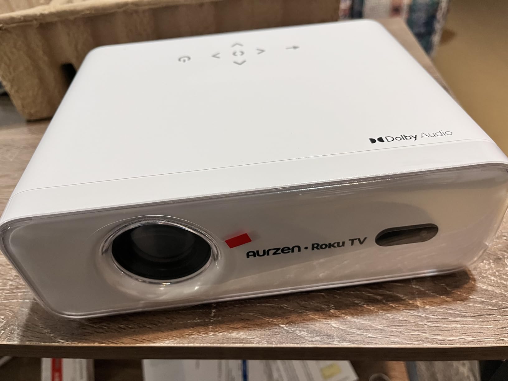Aurzen Roku TV Smart Projector with Wifi and Bluetooth, Roku Streaming Experience Built-in, 1080P FHD, Dolby Audio, Auto Focus & Keystone, Zoom, Movie Portable Outdoor Mini Projector, White - Customer Photo 1